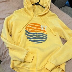 MV Sport Yellow Pullover Hoodie with Orange Accent